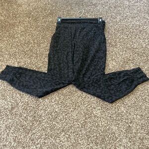 Authentic Lululemon jogger in fun black and gray leopard print size 4